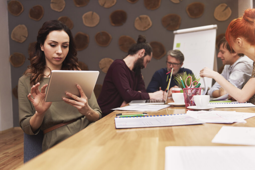group of people working at the fashion office